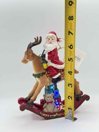Resin Santa Clause on Toy Deer Figurine TC05454