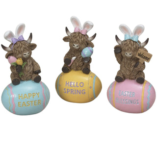 Pre-Order Spring 2026 Resin Easter Highland Cow Sitting on an Egg w/Bunny Ears Set