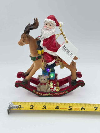 Resin Santa Clause on Toy Deer Figurine TC05454