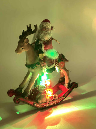 Resin Santa Clause on Toy Deer Figurine TC05454