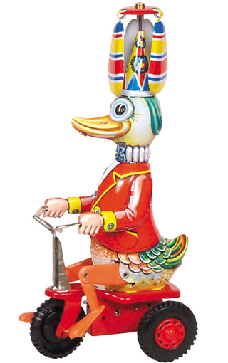 Tin wind-up duck on tricycle RM284