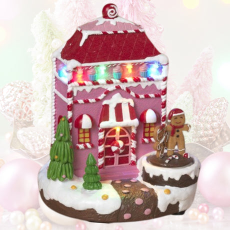 Pre-Order Gerson 7.9"H Lighted Musical Gingerbread House w/ Moving Figurine & Timer 2799060