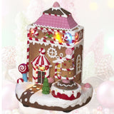 Pre-Order Gerson 7.9"H Lighted Musical Gingerbread House w/ Moving Figurine & Timer 2799060